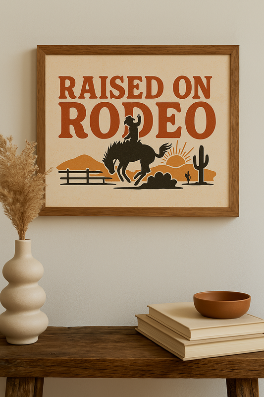 Western art print titled Raised on Rodeo – rustic wall decor by Frontier Prints, inspired by cowboy culture and desert landscapes.
